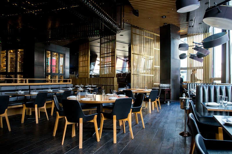 Tavern dining room with wooden tables